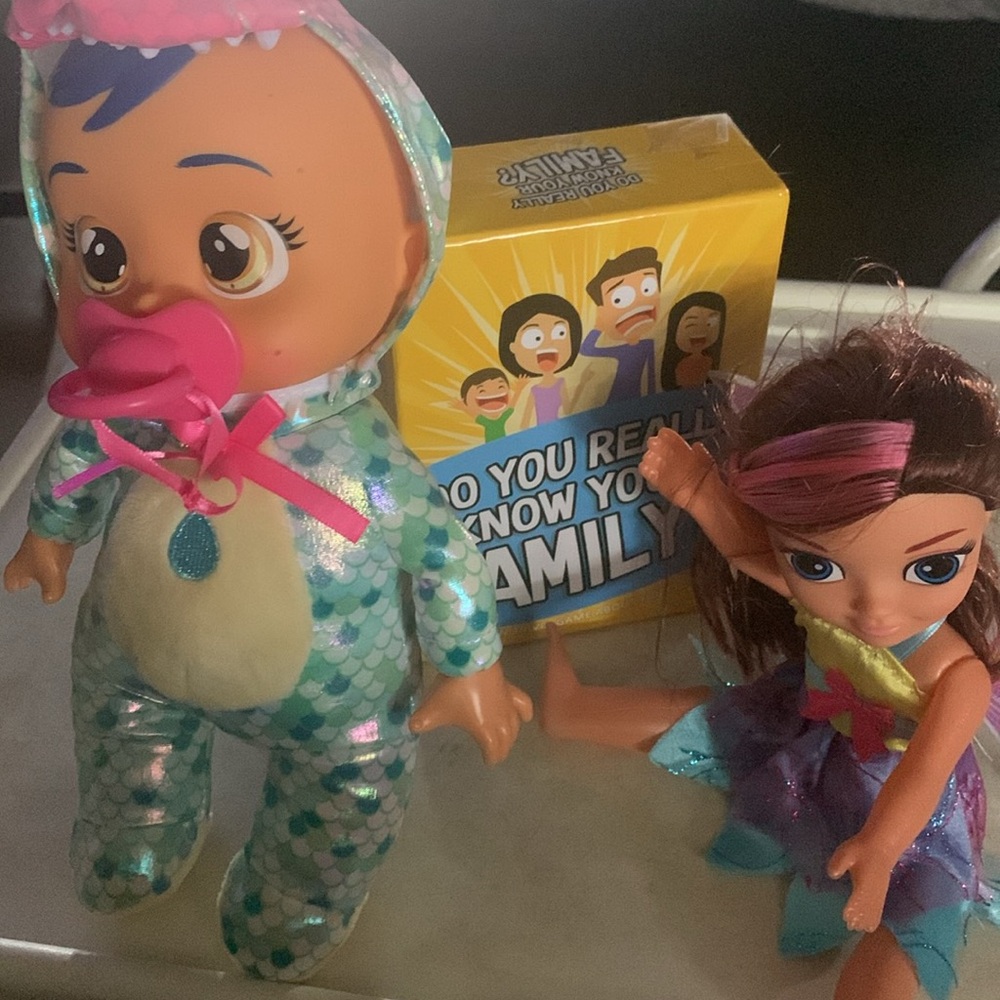 Bundle of 3 items including sealed family game and 2 toys